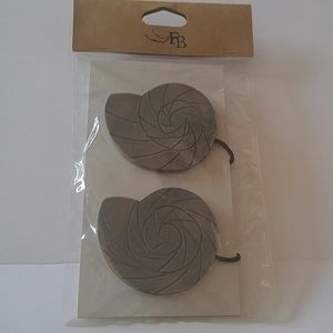 Magnetic drapery tie backs